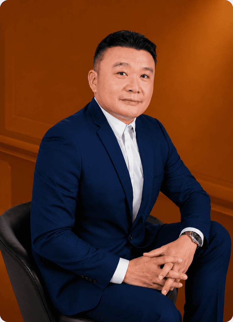 Sebastian, memorial life planner, seated in a navy suit